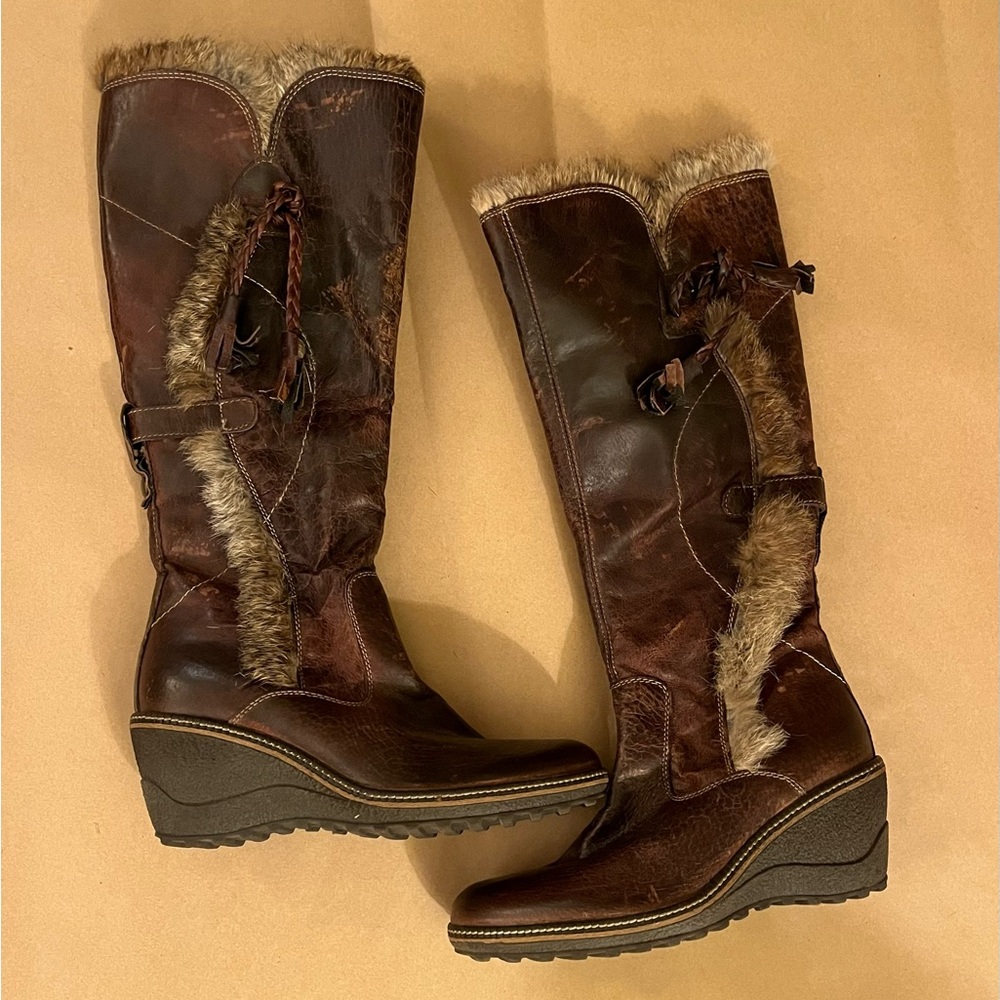 Nine West distressed, brown leather, wedge boots with fur accents. Size 6.